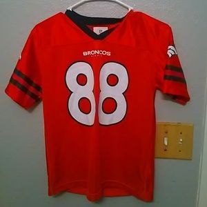 Broncos jersey size large in youth